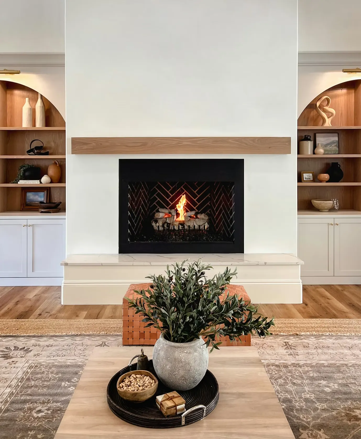 Modern living room with a fireplace serviced by ABDB Home Services