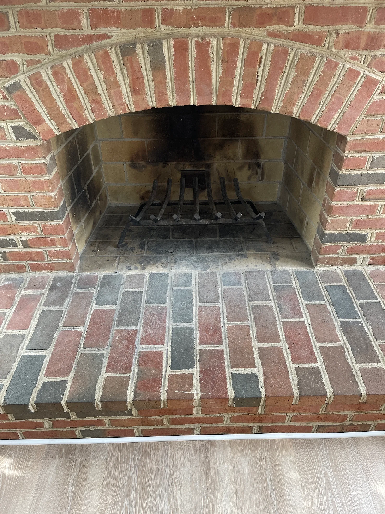 Clean modern fireplace with fresh brickwork